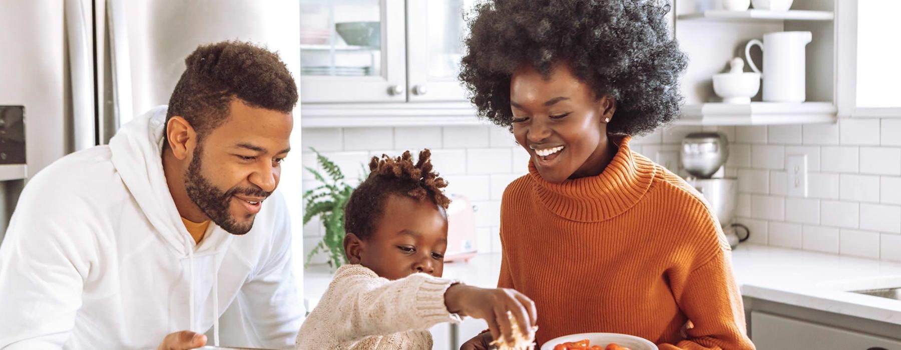 a family cooking together